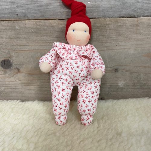 Zonnekindpopje Knufje - rood met bloemetje